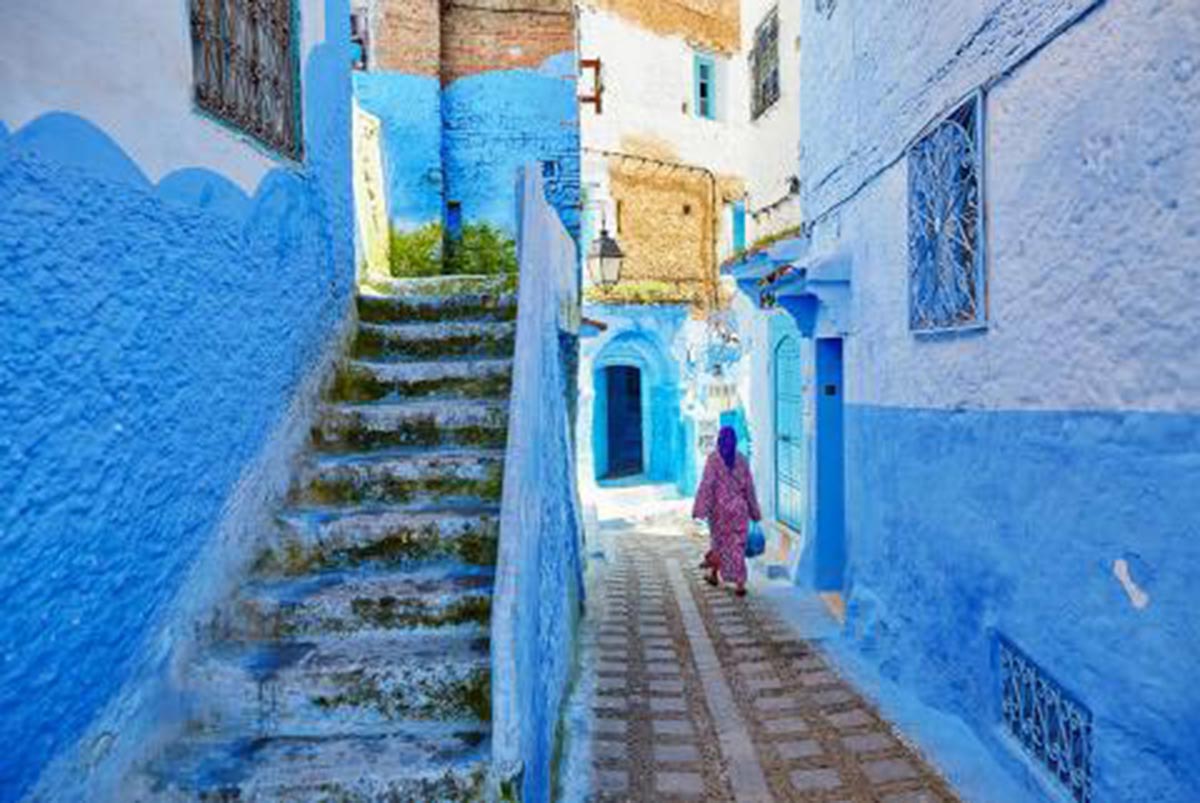 casa blanca streets with bright blue painted steps