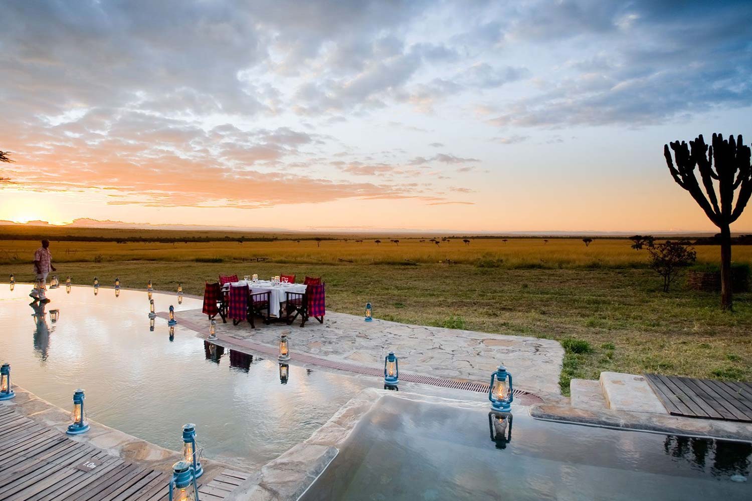 beautiful outdoor pool and dining table