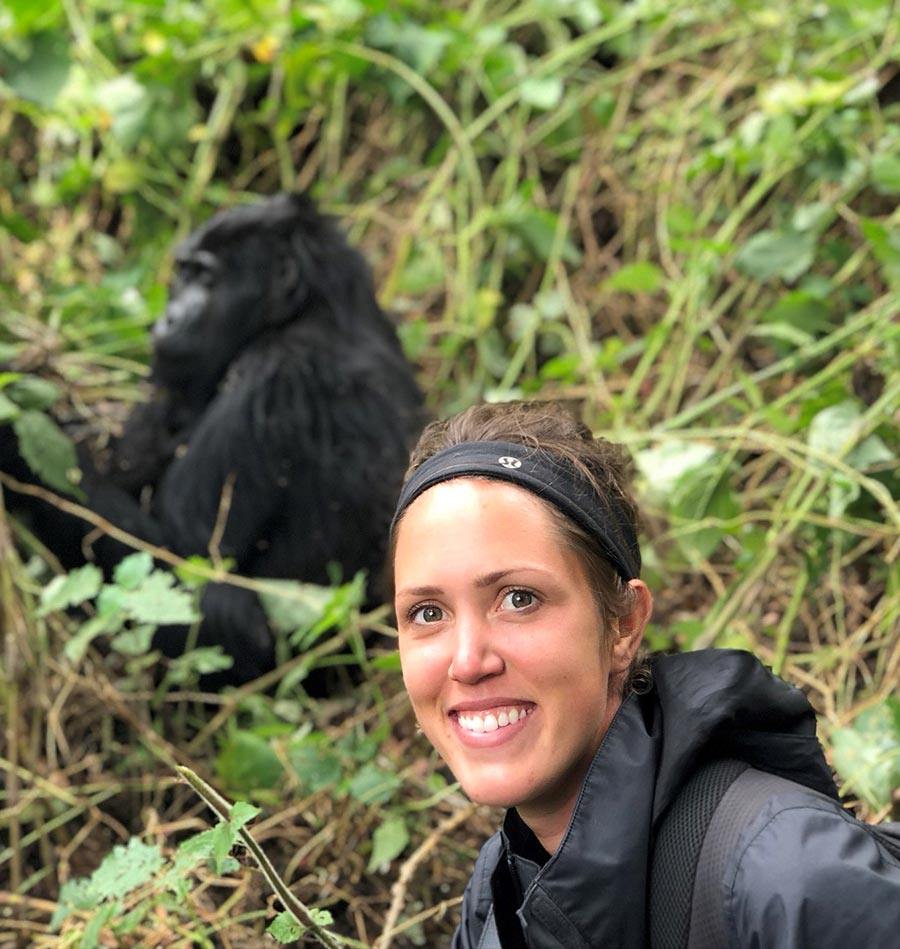 Guide Kayla Peckford next to gorilla