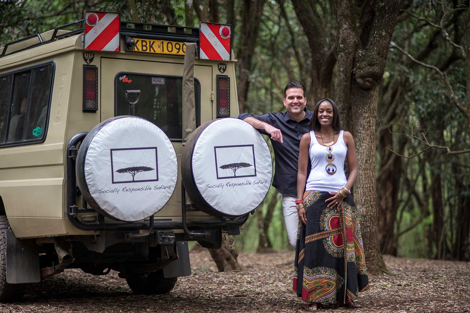 Ryan and Liza next to Socially Responsible Safari truck