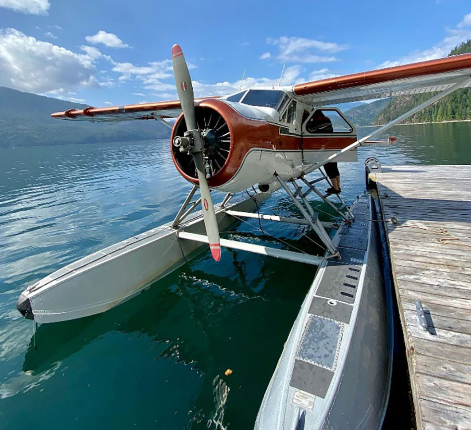 float plane docked at jetty